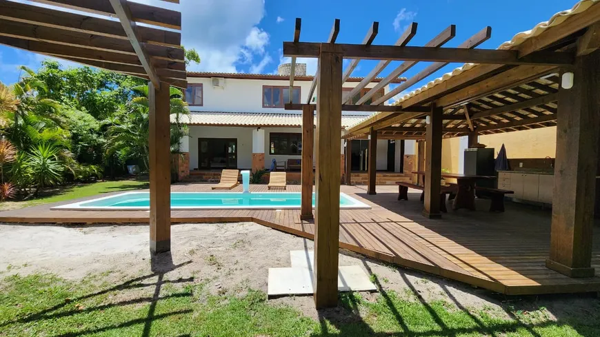 Foto 1 de Casa de Condomínio com 6 Quartos à venda, 400m² em Guarajuba, Camaçari