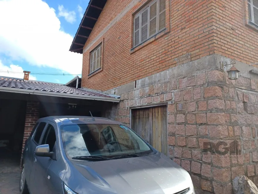 Foto 1 de Casa com 3 Quartos à venda, 144m² em Vila Nova, Porto Alegre