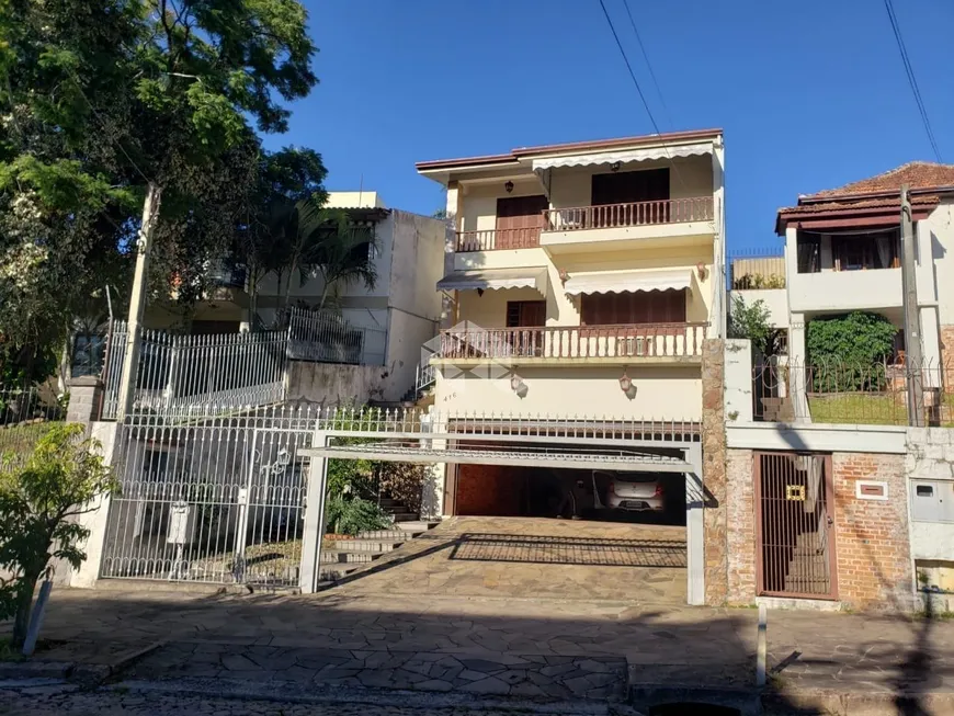 Foto 1 de Casa com 5 Quartos à venda, 592m² em Santo Antônio, Porto Alegre