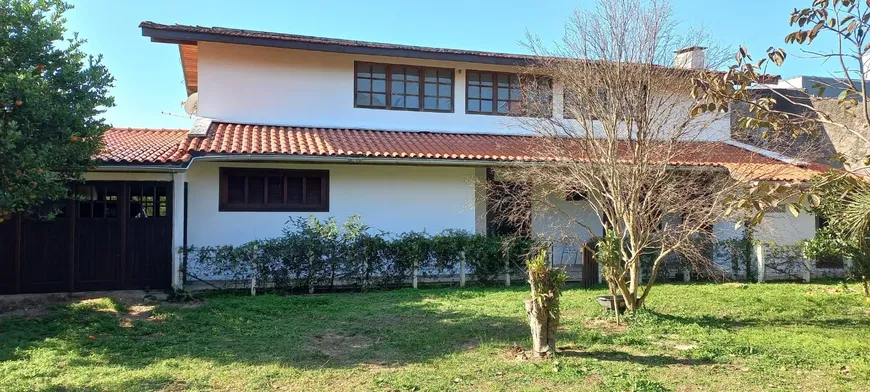 Foto 1 de Casa com 4 Quartos à venda, 300m² em Rio Tavares, Florianópolis