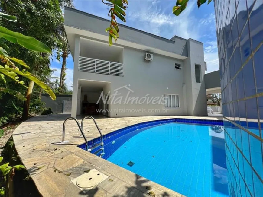 Foto 1 de Casa de Condomínio com 4 Quartos à venda, 260m² em Loteamento Costa do Sol, Bertioga