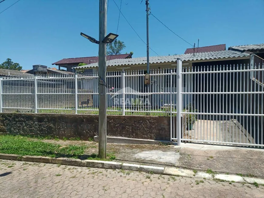 Foto 1 de Casa de Condomínio com 2 Quartos à venda, 45m² em Fiuza, Viamão