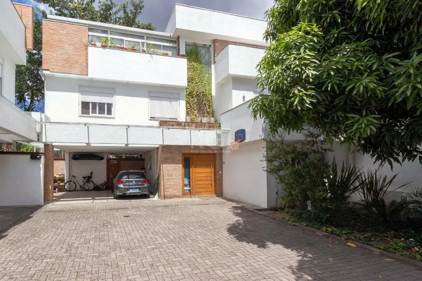 Foto 1 de Casa de Condomínio com 4 Quartos à venda, 312m² em Jardim Isabel, Porto Alegre