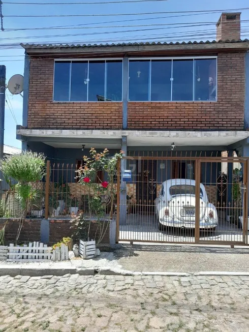 Foto 1 de Casa com 4 Quartos à venda, 159m² em Restinga, Porto Alegre