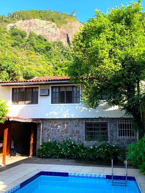 Foto 1 de Casa com 4 Quartos à venda, 316m² em Barra da Tijuca, Rio de Janeiro