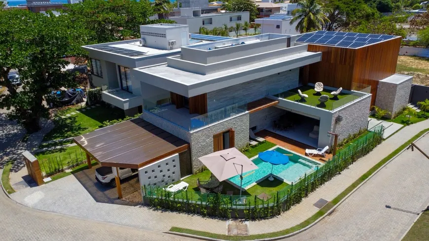 Foto 1 de Casa de Condomínio com 5 Quartos à venda, 416m² em Guarajuba, Camaçari