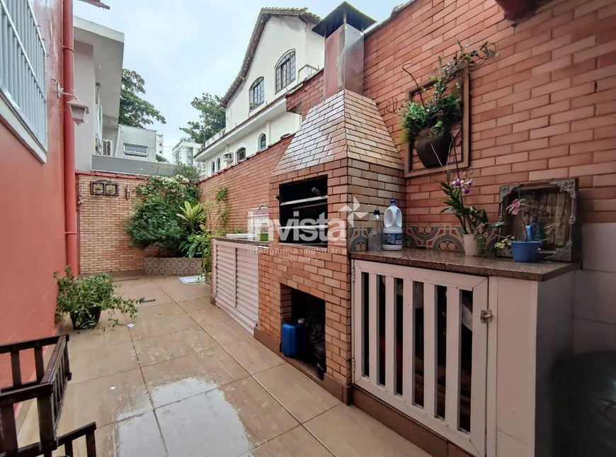 Foto 1 de Casa com 4 Quartos à venda, 210m² em Ponta da Praia, Santos