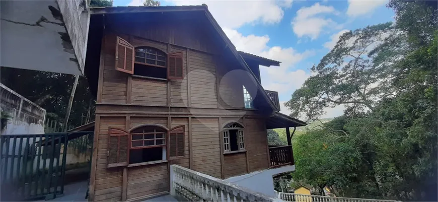 Foto 1 de Casa de Condomínio com 3 Quartos à venda, 210m² em Serra da Cantareira, Mairiporã