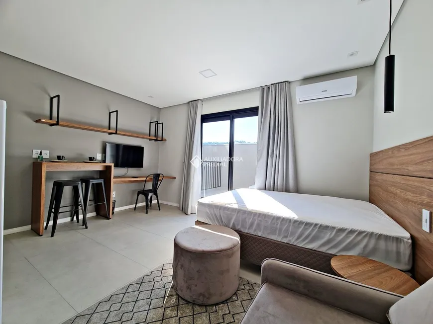 Foto 1 de Apartamento com 1 Quarto à venda, 26m² em Vila Nova, Novo Hamburgo