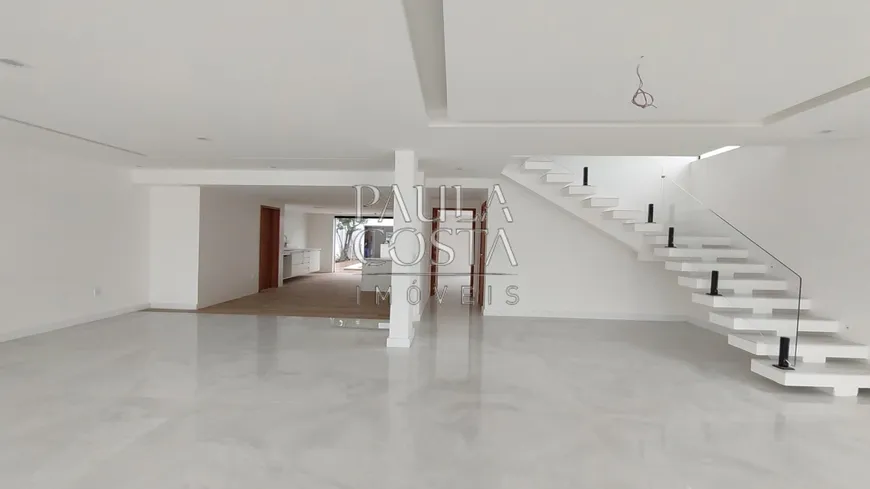 Foto 1 de Casa de Condomínio com 4 Quartos à venda, 420m² em Barra da Tijuca, Rio de Janeiro