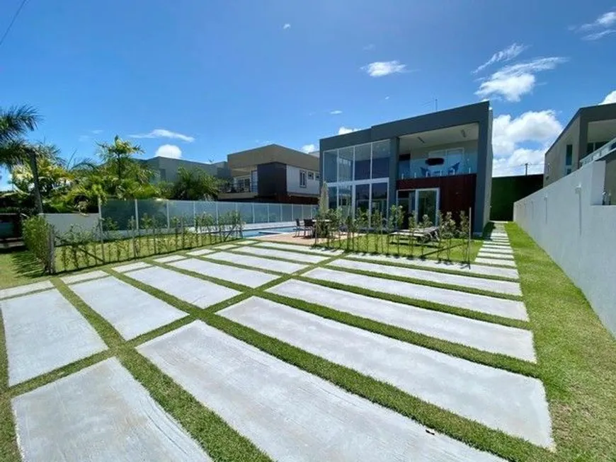 Foto 1 de Casa de Condomínio com 6 Quartos à venda, 278m² em Guarajuba, Camaçari
