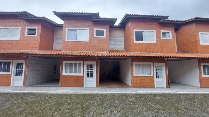 Foto 1 de Casa de Condomínio com 3 Quartos à venda, 99m² em Jardim Luciana, Mongaguá