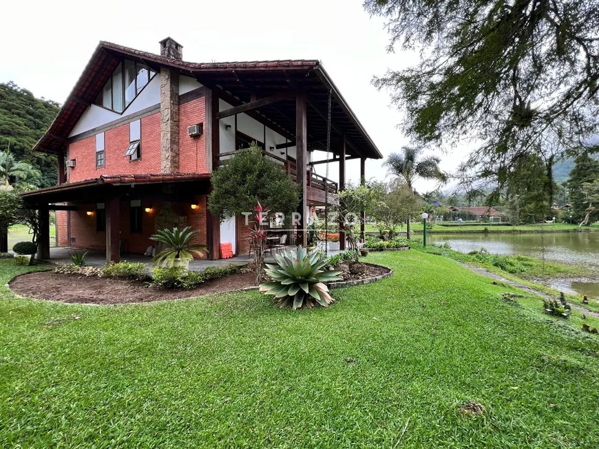 Foto 1 de Casa de Condomínio com 4 Quartos à venda, 371m² em Carlos Guinle, Teresópolis