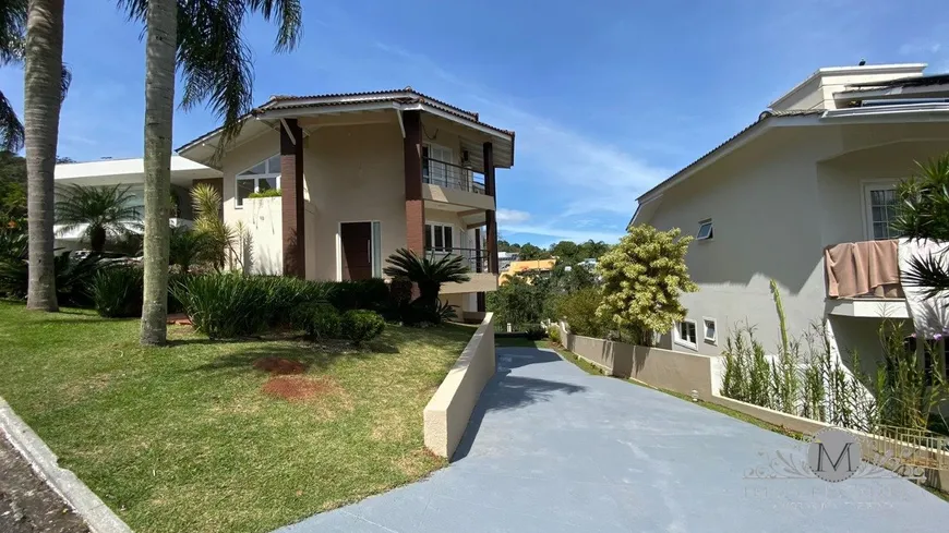 Foto 1 de Casa de Condomínio com 5 Quartos à venda, 402m² em Cacupé, Florianópolis
