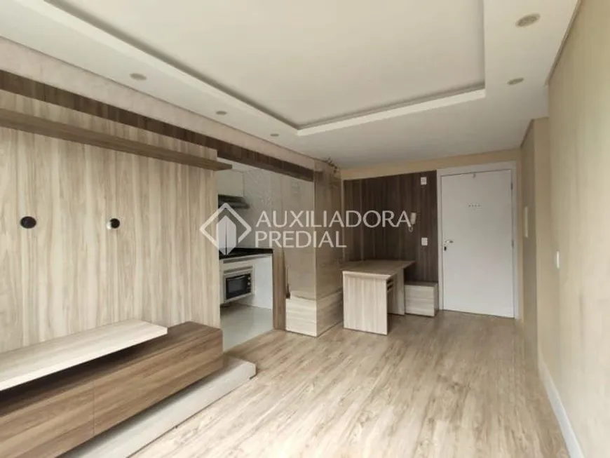 Foto 1 de Apartamento com 2 Quartos à venda, 58m² em Vila Nova, Porto Alegre