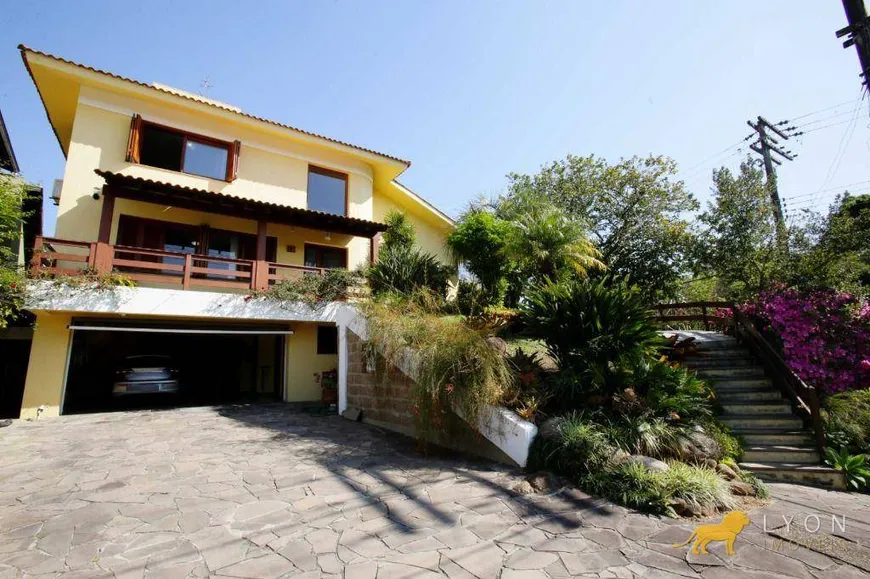 Foto 1 de Casa de Condomínio com 3 Quartos à venda, 389m² em Vila Nova, Porto Alegre