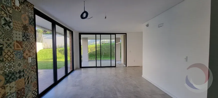 Foto 1 de Casa de Condomínio com 4 Quartos à venda, 530m² em Cacupé, Florianópolis