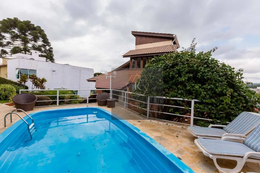 Foto 1 de Casa de Condomínio com 4 Quartos à venda, 455m² em São João, Curitiba