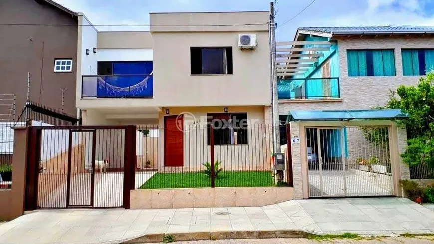 Foto 1 de Casa com 3 Quartos à venda, 142m² em Lomba do Pinheiro, Porto Alegre