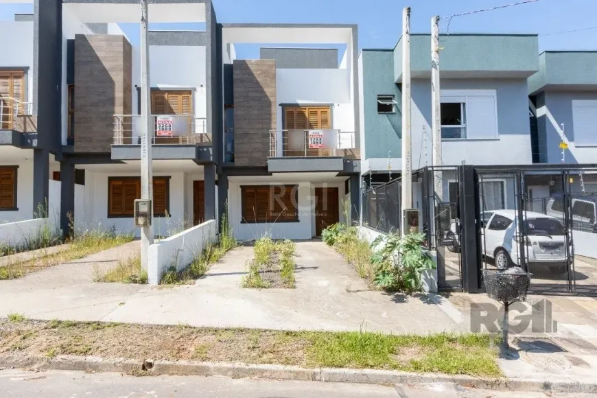 Foto 1 de Casa com 3 Quartos à venda, 179m² em Guarujá, Porto Alegre