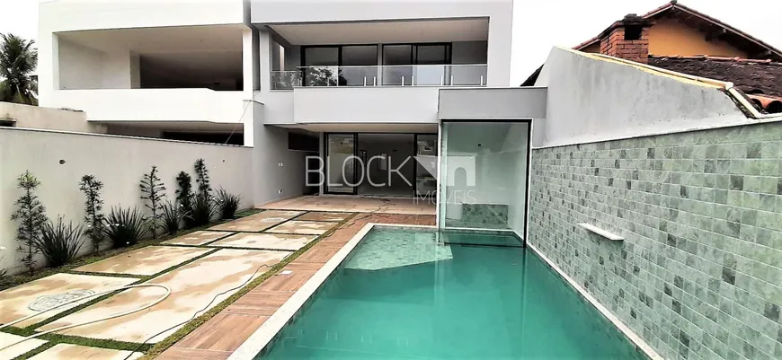 Foto 1 de Casa de Condomínio com 4 Quartos à venda, 310m² em Barra da Tijuca, Rio de Janeiro