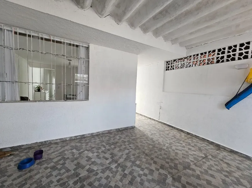 Foto 1 de Casa com 2 Quartos à venda, 81m² em Vila Tupi, Praia Grande