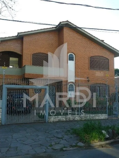 Foto 1 de Casa com 5 Quartos à venda, 324m² em Menino Deus, Porto Alegre