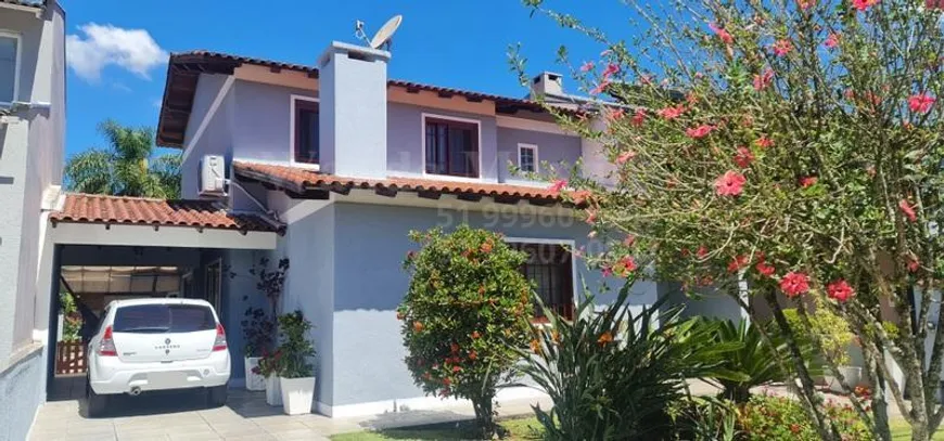 Foto 1 de Casa de Condomínio com 4 Quartos à venda, 330m² em Condominio Cantegril, Viamão