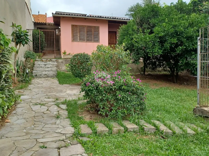 Foto 1 de Casa com 2 Quartos à venda, 100m² em Vila Nova, Porto Alegre