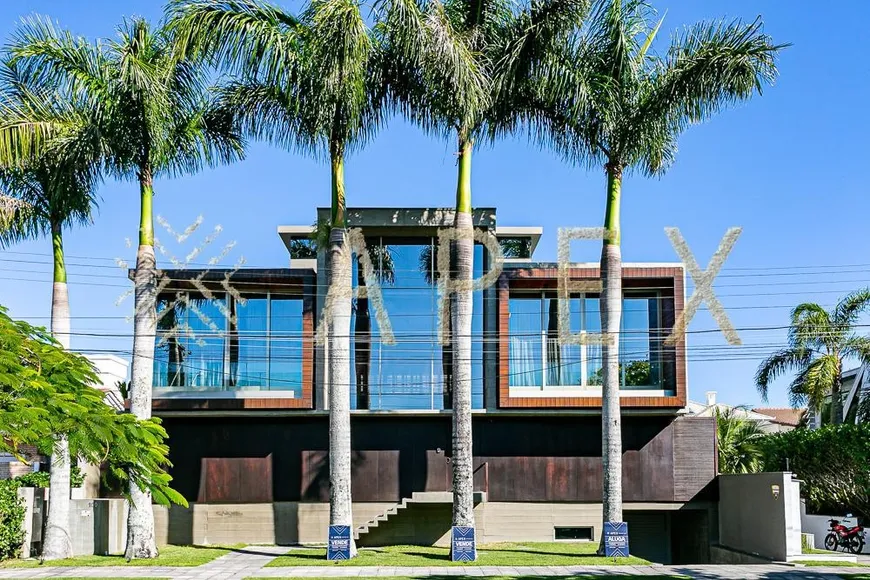 Foto 1 de Casa com 5 Quartos para venda ou aluguel, 1300m² em Jurerê Internacional, Florianópolis