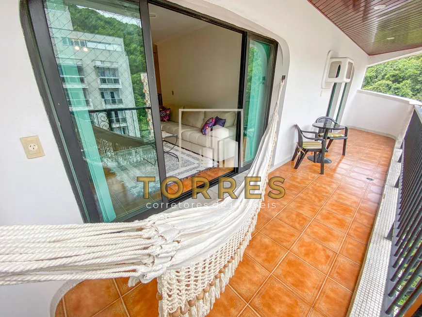Foto 1 de Apartamento com 4 Quartos à venda, 150m² em Praia das Pitangueiras, Guarujá
