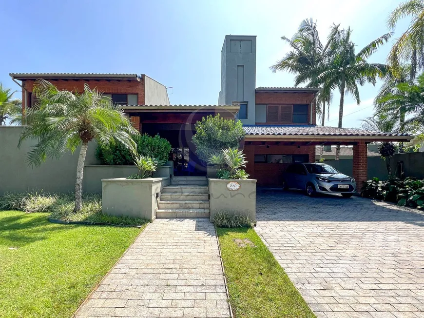 Foto 1 de Casa de Condomínio com 6 Quartos à venda, 577m² em Jardim Acapulco , Guarujá