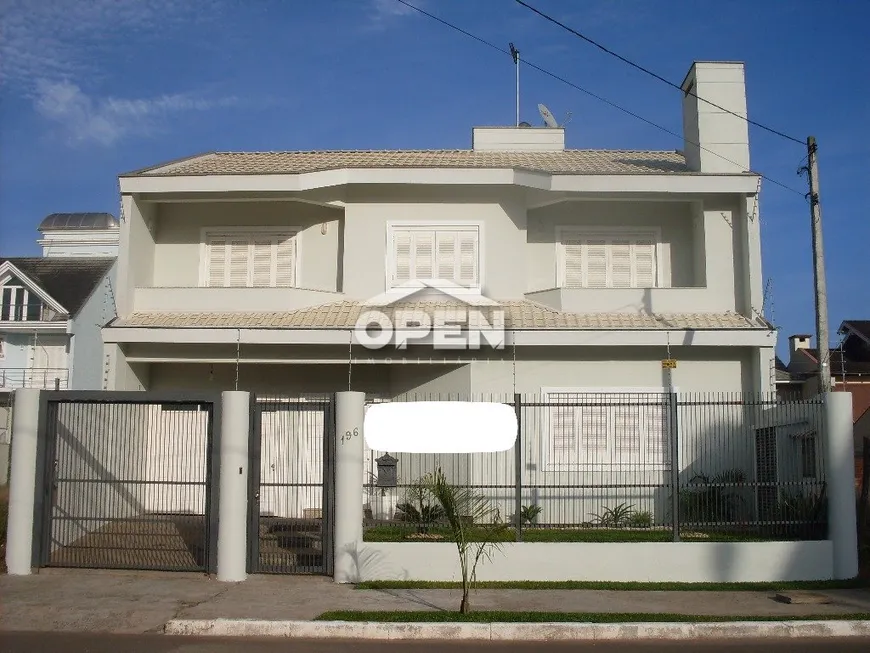 Foto 1 de Sobrado com 4 Quartos à venda, 258m² em Marechal Rondon, Canoas