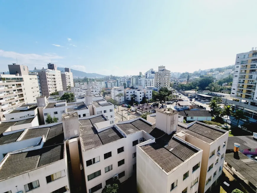 Foto 1 de Apartamento com 2 Quartos à venda, 59m² em Itacorubi, Florianópolis