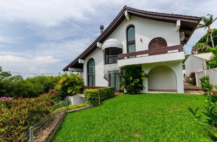 Foto 1 de Casa com 4 Quartos à venda, 456m² em Vila Assunção, Porto Alegre