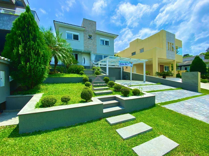 Foto 1 de Casa de Condomínio com 4 Quartos à venda, 168m² em Condominio Buena Vista, Viamão