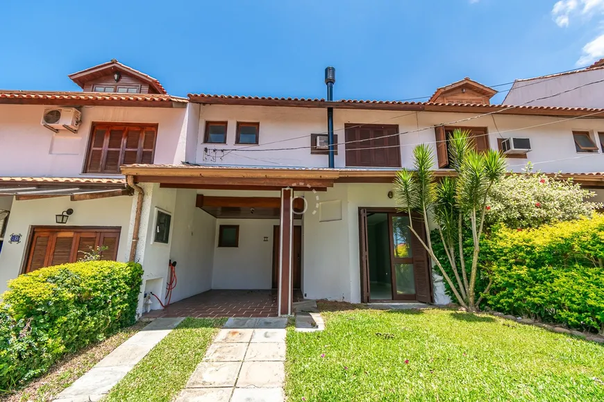 Foto 1 de Casa de Condomínio com 3 Quartos à venda, 130m² em Cavalhada, Porto Alegre