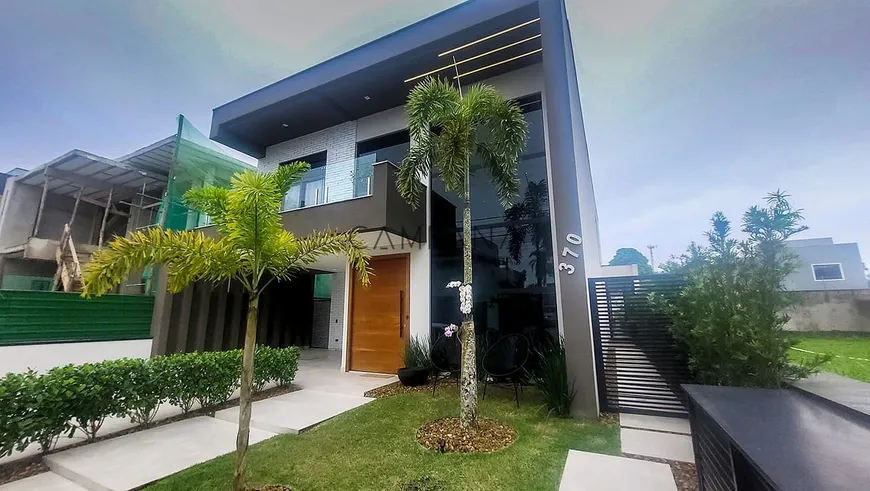 Foto 1 de Casa de Condomínio com 4 Quartos à venda, 315m² em Massaguaçu, Caraguatatuba