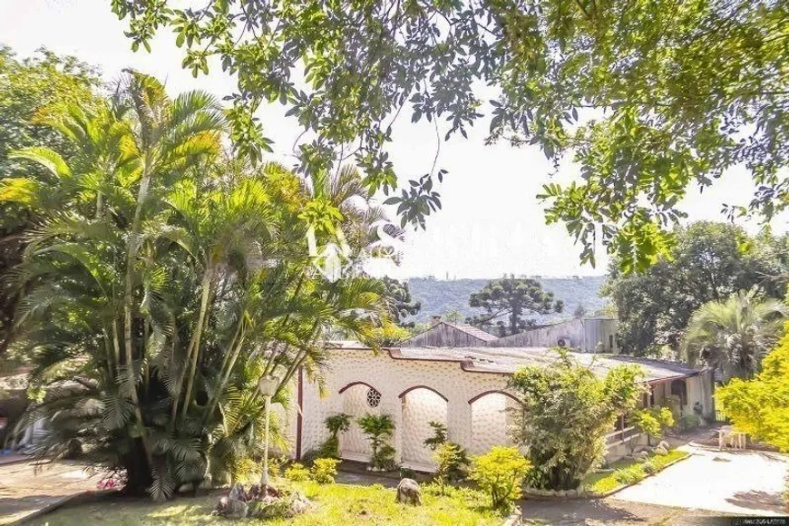 Foto 1 de Casa com 4 Quartos à venda, 250m² em Agronomia, Porto Alegre