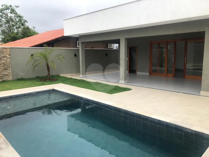 Foto 1 de Casa de Condomínio com 4 Quartos à venda, 290m² em Morada da Praia, Bertioga