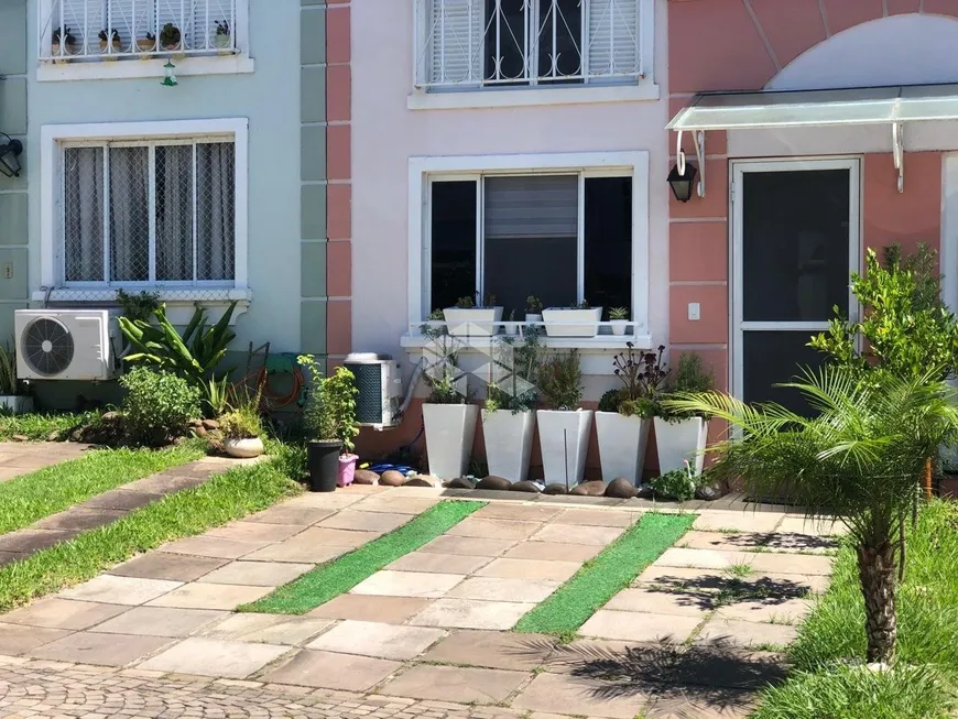 Foto 1 de Casa com 3 Quartos à venda, 79m² em Cavalhada, Porto Alegre