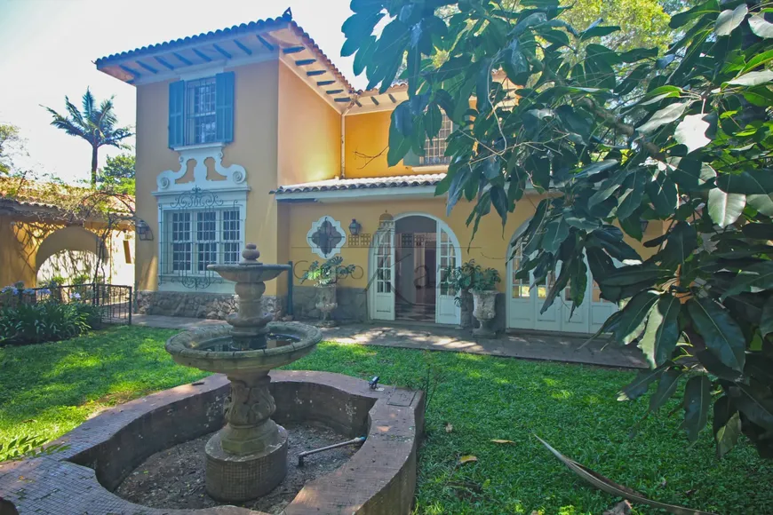 Foto 1 de Casa com 4 Quartos para venda ou aluguel, 617m² em Jardim América, São Paulo