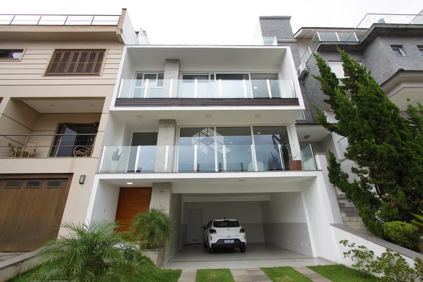 Foto 1 de Casa de Condomínio com 3 Quartos à venda, 284m² em Vila Nova, Porto Alegre