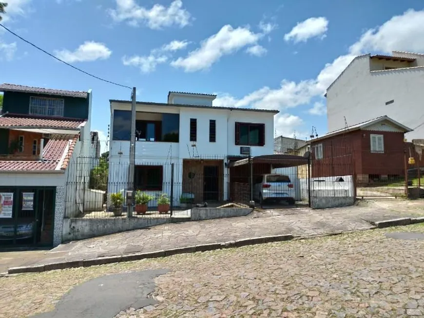 Foto 1 de Casa com 3 Quartos à venda, 166m² em Vila João Pessoa, Porto Alegre