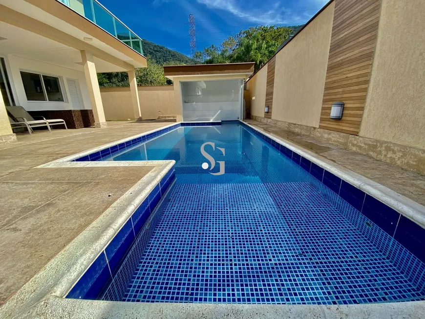 Foto 1 de Casa de Condomínio com 4 Quartos à venda, 280m² em Lagoinha, Ubatuba