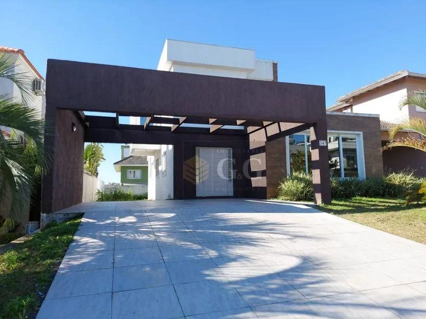 Foto 1 de Casa de Condomínio com 3 Quartos para venda ou aluguel, 300m² em Condominio Buena Vista, Viamão