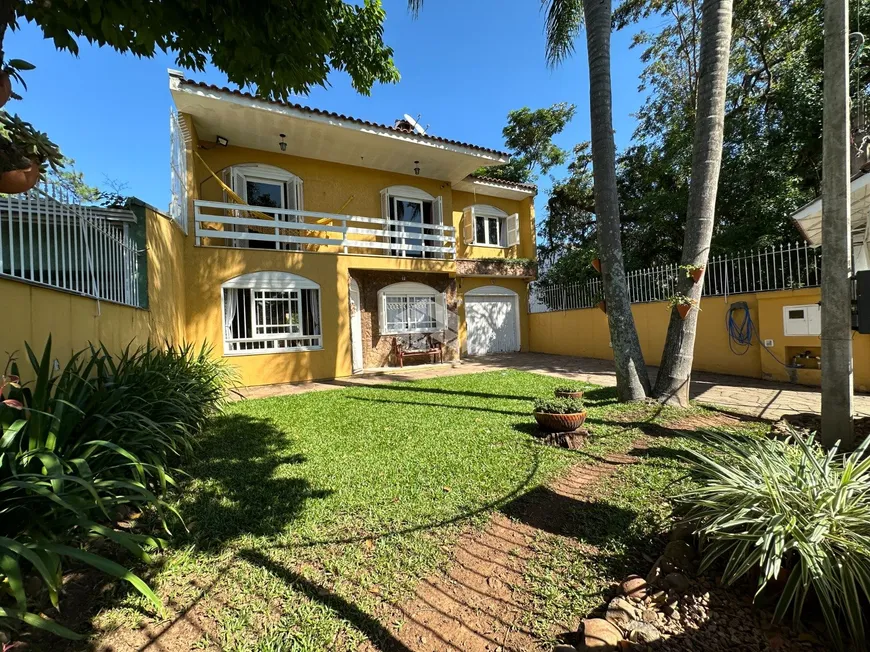 Foto 1 de Casa com 4 Quartos à venda, 212m² em Fátima, Canoas