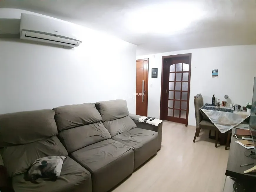 Foto 1 de Apartamento com 2 Quartos à venda, 64m² em Santo Antônio, Porto Alegre