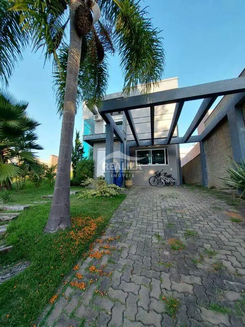 Foto 1 de Casa de Condomínio com 3 Quartos à venda, 200m² em Querência, Viamão