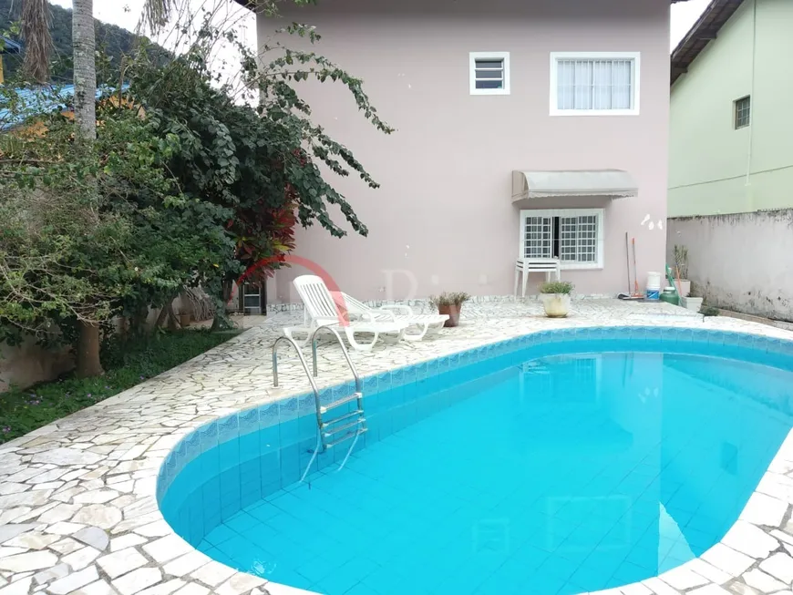 Foto 1 de Casa de Condomínio com 5 Quartos à venda, 202m² em Barequecaba, São Sebastião